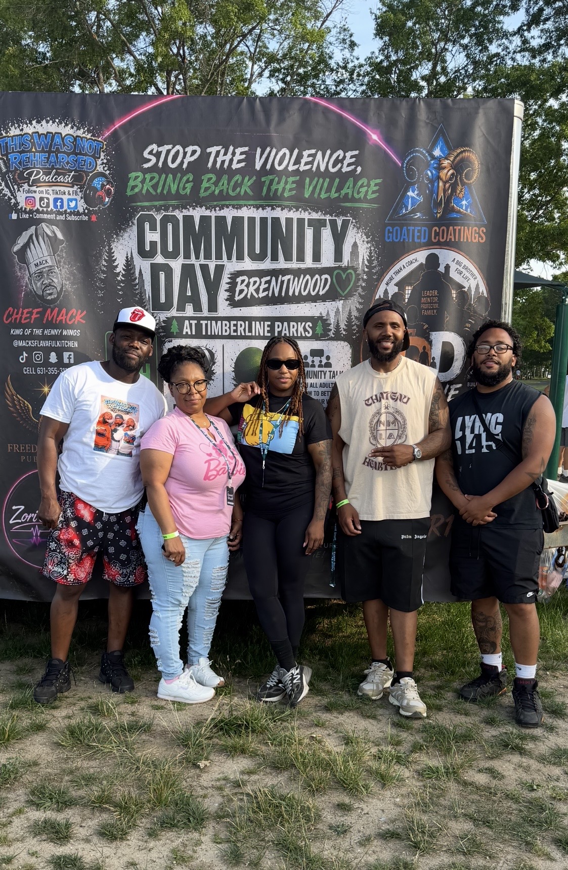Community members in front of the Community Day Brentwood banner